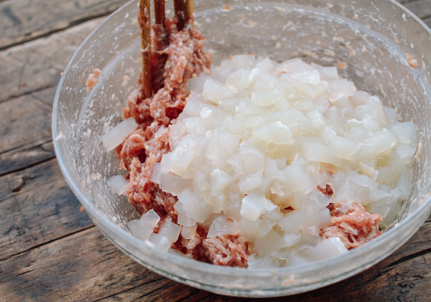 Mixing pork and aspic to make filling, by jcghk.dfhdjkvfj.cf