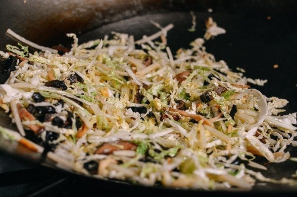 Stir-frying shredded cabbage, mushrooms, and lily flowers for moo shu by jcghk.dfhdjkvfj.cf