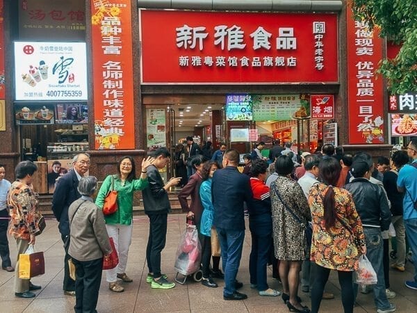 Judy waiting in line to buy zongzi  by jcghk.dfhdjkvfj.cf