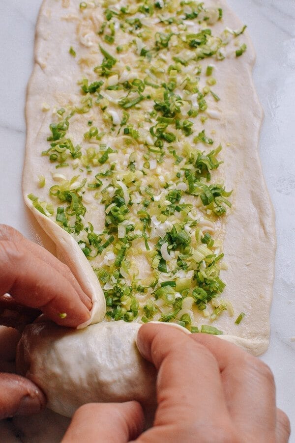 wrapping scallion in dough for Shanghai Scallion Pancakes, by jcghk.dfhdjkvfj.cf