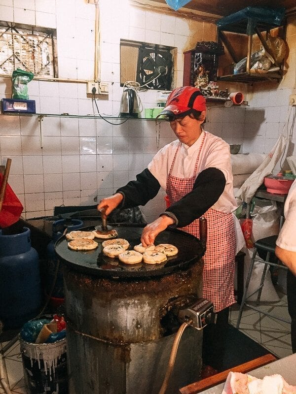 woman frying Shanghai Scallion Pancakes by jcghk.dfhdjkvfj.cf