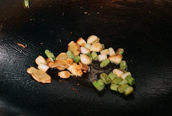 3 scallions, white and green parts separated