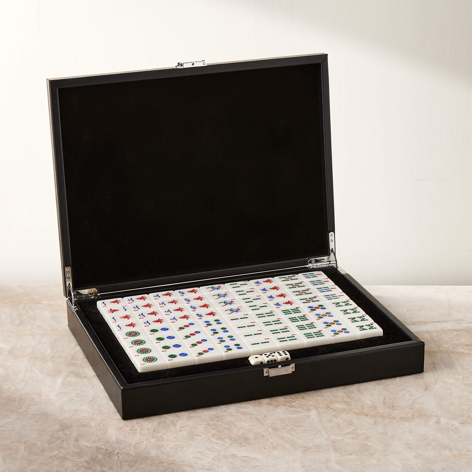 mahjong set in a black leather case
