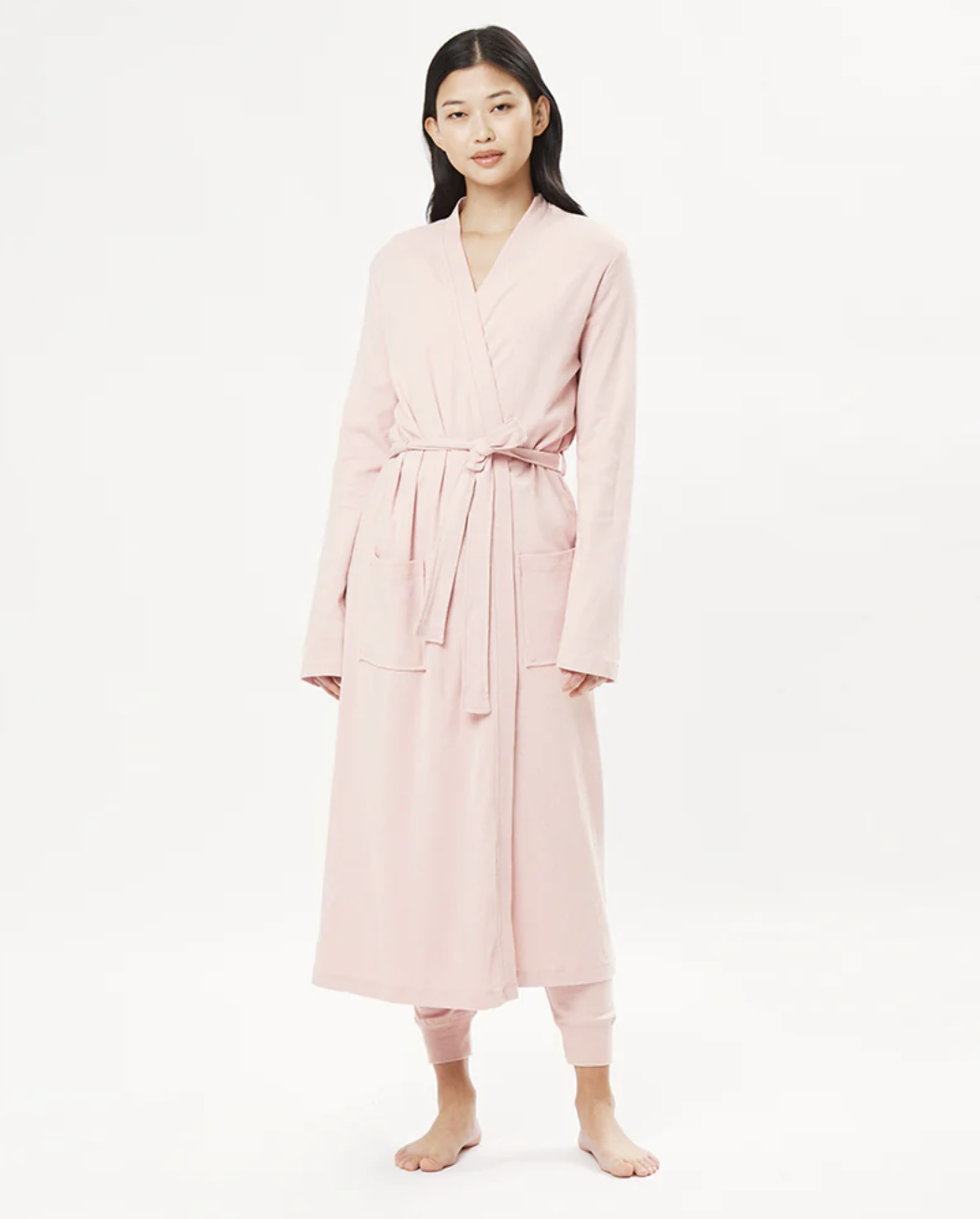 Pink organic cotton robe worn by an Asian model