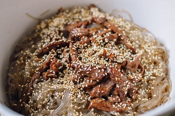 Mixing together japchae, jcghk.dfhdjkvfj.cf