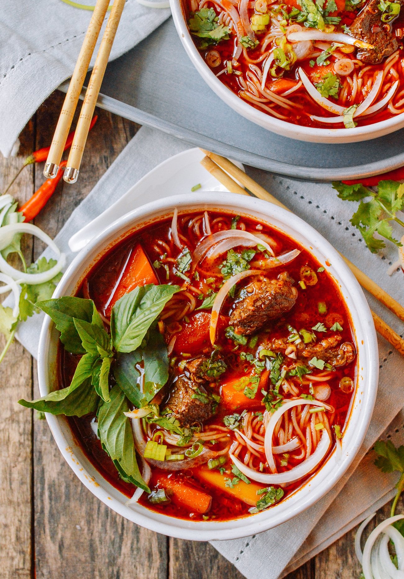 Bowl of Bho Kho Vietnamese beef stew with rice noodles