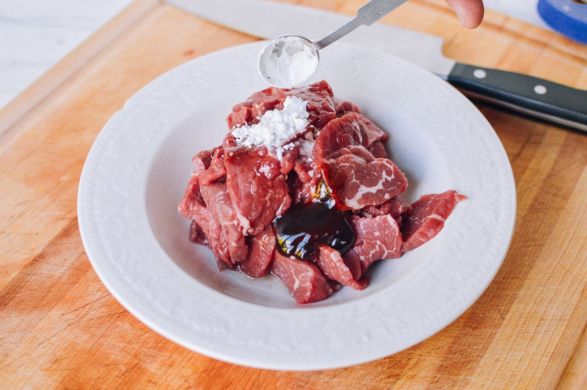 adding corn starch and baking soda marinade to beef by jcghk.dfhdjkvfj.cf