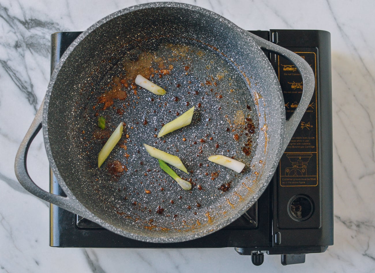 scallions in pan