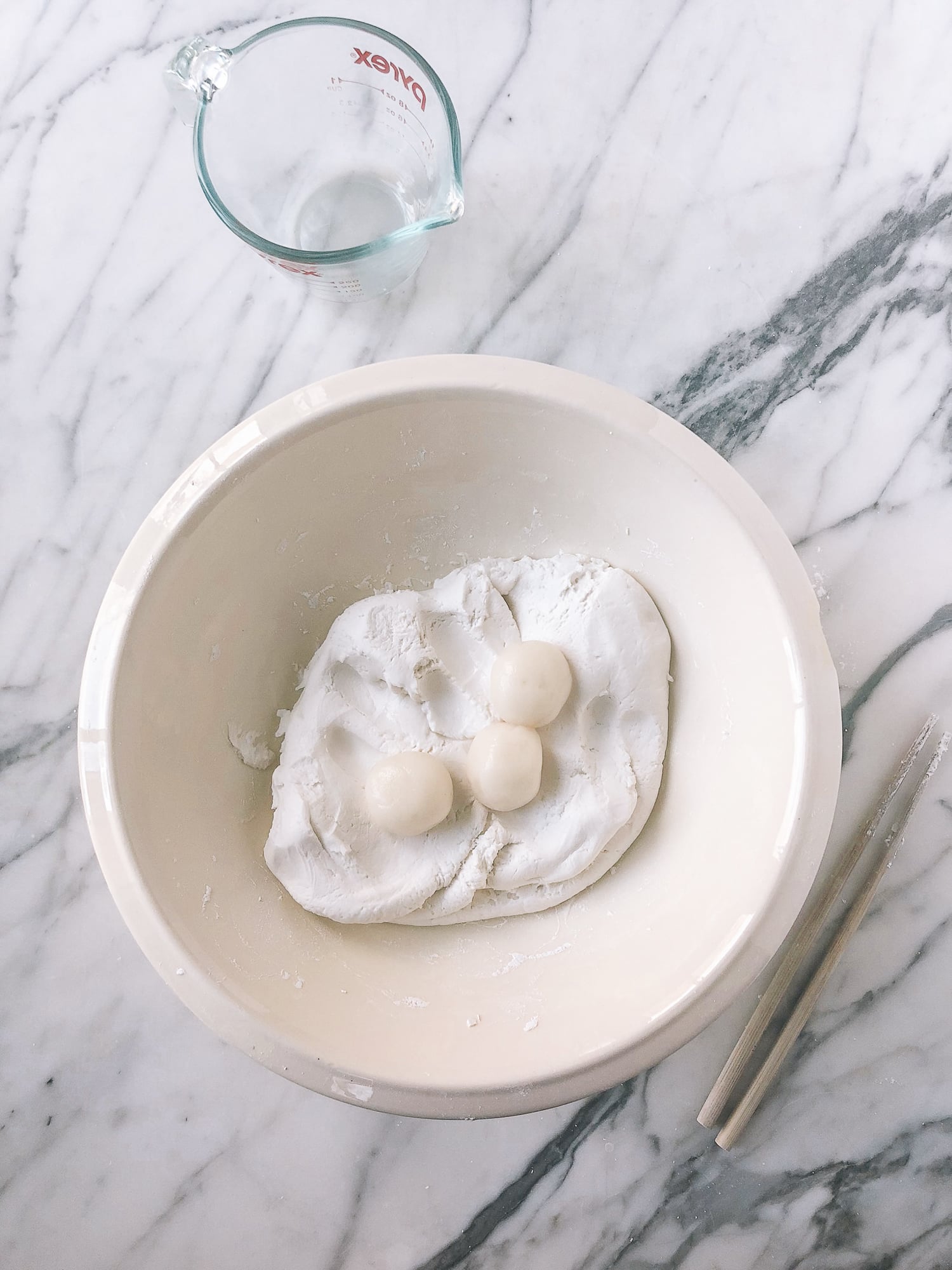 adding cooked rice balls to raw rice flour dough in bowl, by jcghk.dfhdjkvfj.cf