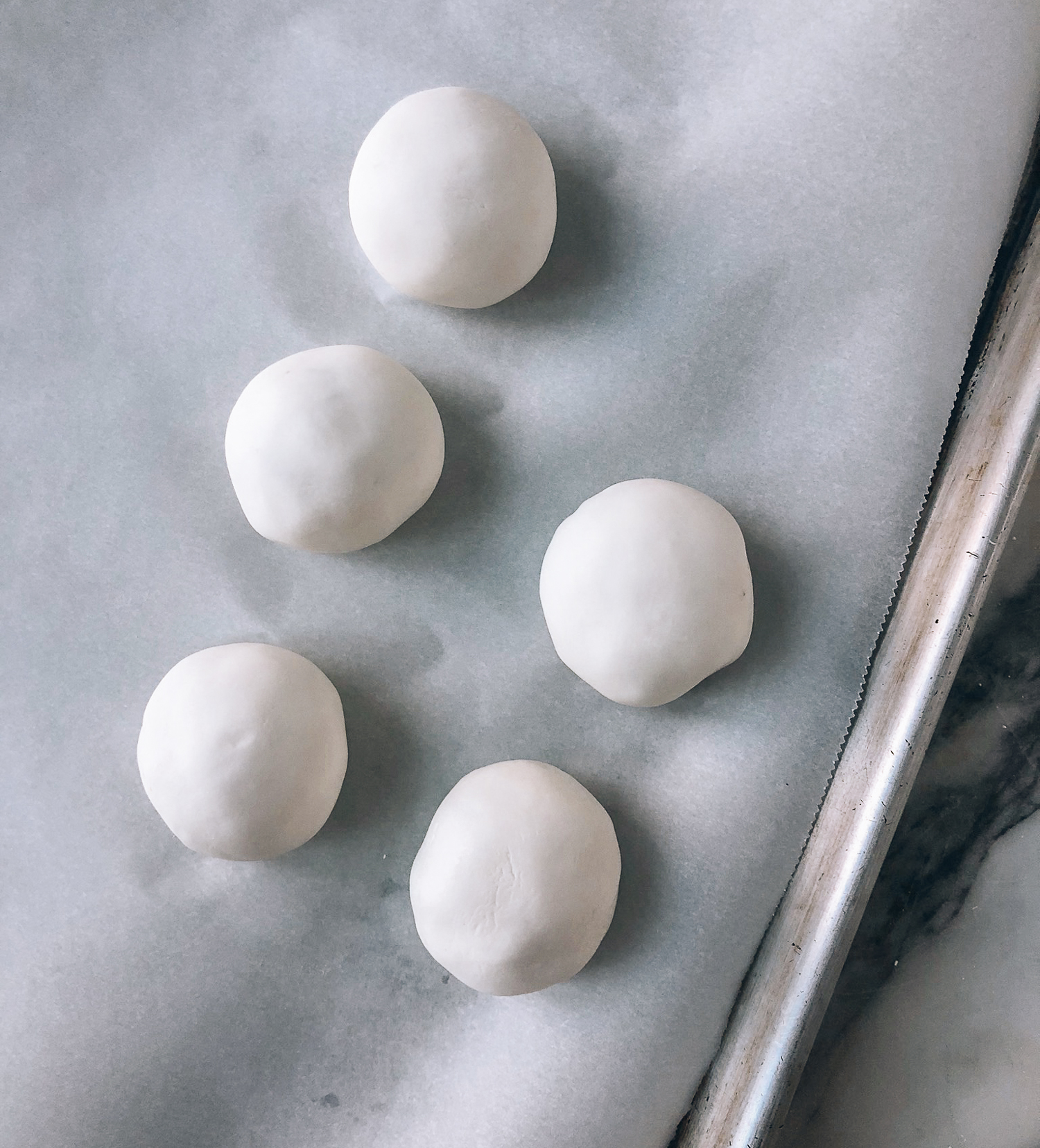 uncooked Savory Tang Yuan sitting on parchment paper, by jcghk.dfhdjkvfj.cf