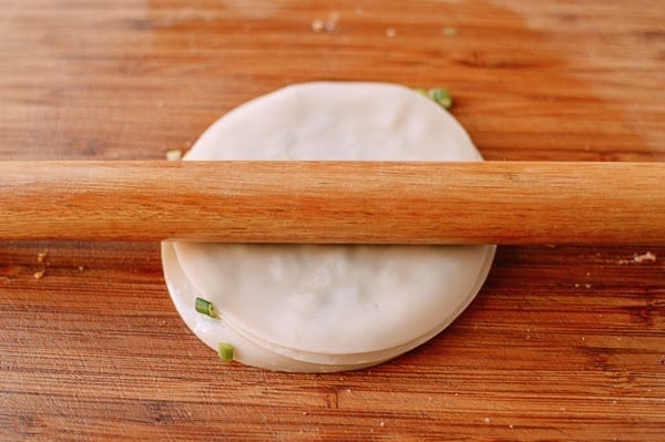 Rolling out scallion pancake made with layered dumpling wrappers, jcghk.dfhdjkvfj.cf