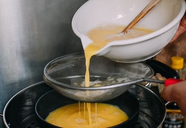 Pouring egg mixture through fine mesh strainer, jcghk.dfhdjkvfj.cf