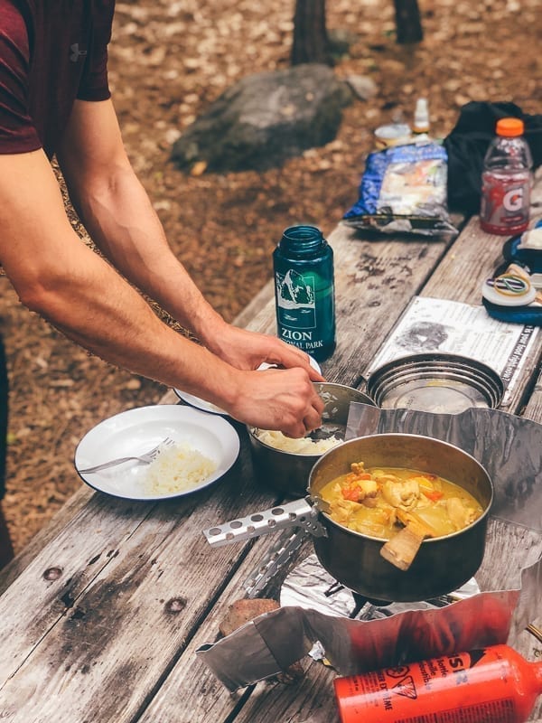 Cooking chicken curry over camping stove, jcghk.dfhdjkvfj.cf