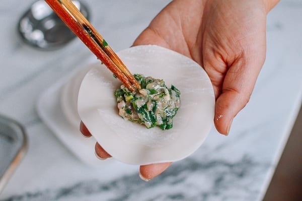 Adding a tablespoon of filling to dumpling wrapper, jcghk.dfhdjkvfj.cf