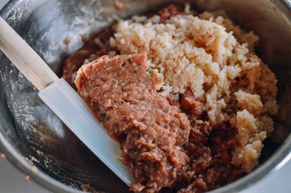Adding minced water chestnuts to meat mixture, jcghk.dfhdjkvfj.cf