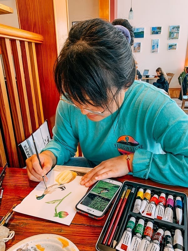 Kaitlin painting watercolors on a rainy day, jcghk.dfhdjkvfj.cf