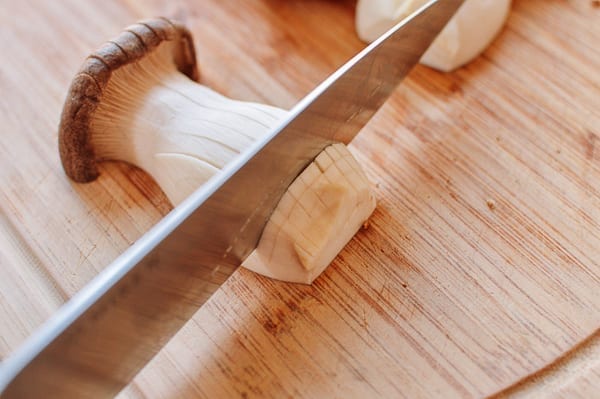 Scoring king oyster mushroom with knife, jcghk.dfhdjkvfj.cf