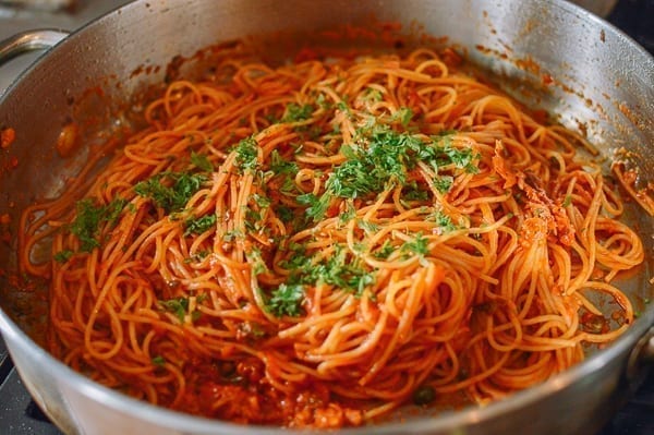 Garnishing tuna tomato pasta with fresh herbs, jcghk.dfhdjkvfj.cf