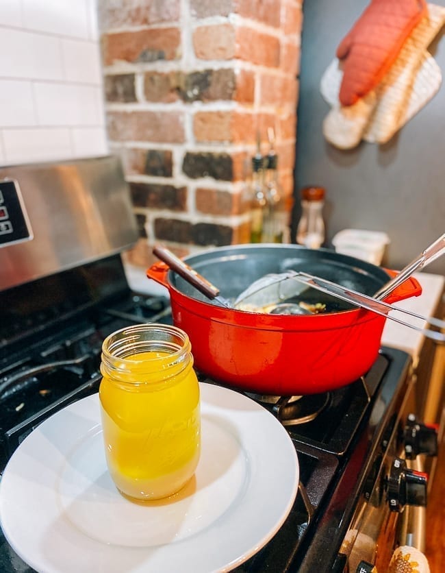 Straining rendered duck fat into a jar, jcghk.dfhdjkvfj.cf