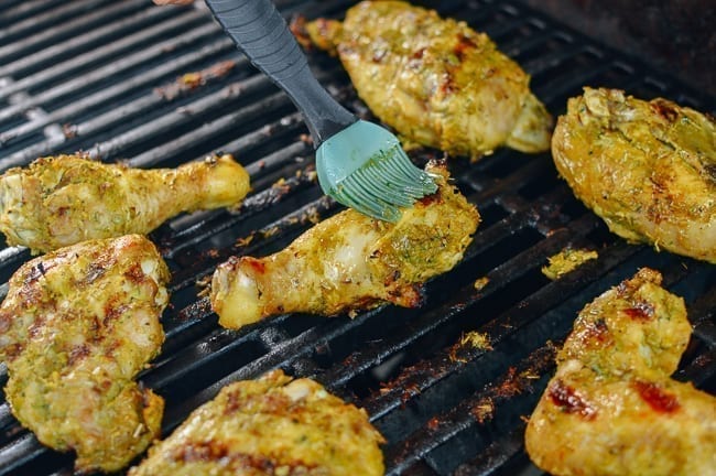 Basting gai yang chicken with marinade, jcghk.dfhdjkvfj.cf