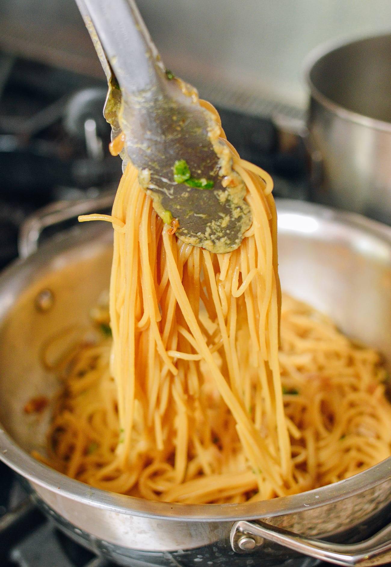 Tossing garlic noodles in sauce, jcghk.dfhdjkvfj.cf