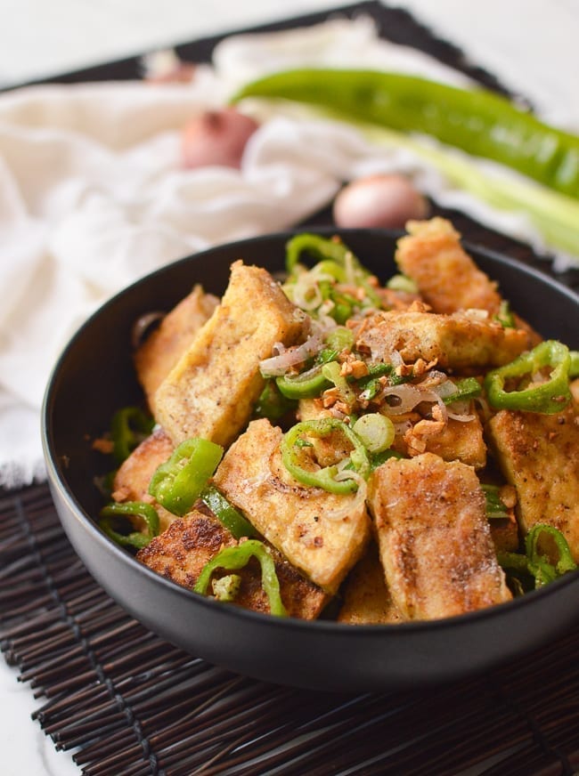 Salt and pepper tofu in black bowl, jcghk.dfhdjkvfj.cf