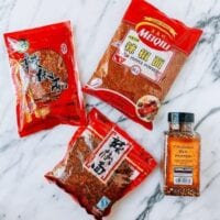 Sichuan chili flakes next to regular crushed red pepper, jcghk.dfhdjkvfj.cf