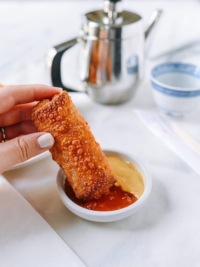 Dipping egg roll into duck sauce and hot mustard, jcghk.dfhdjkvfj.cf
