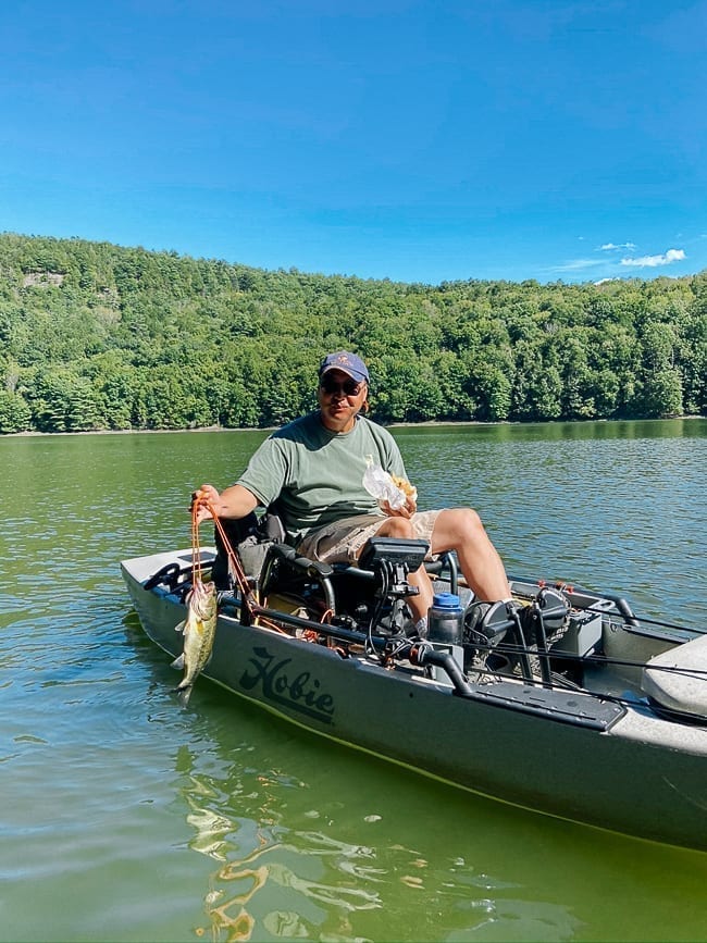Bill on fishing kayak holding catch, jcghk.dfhdjkvfj.cf