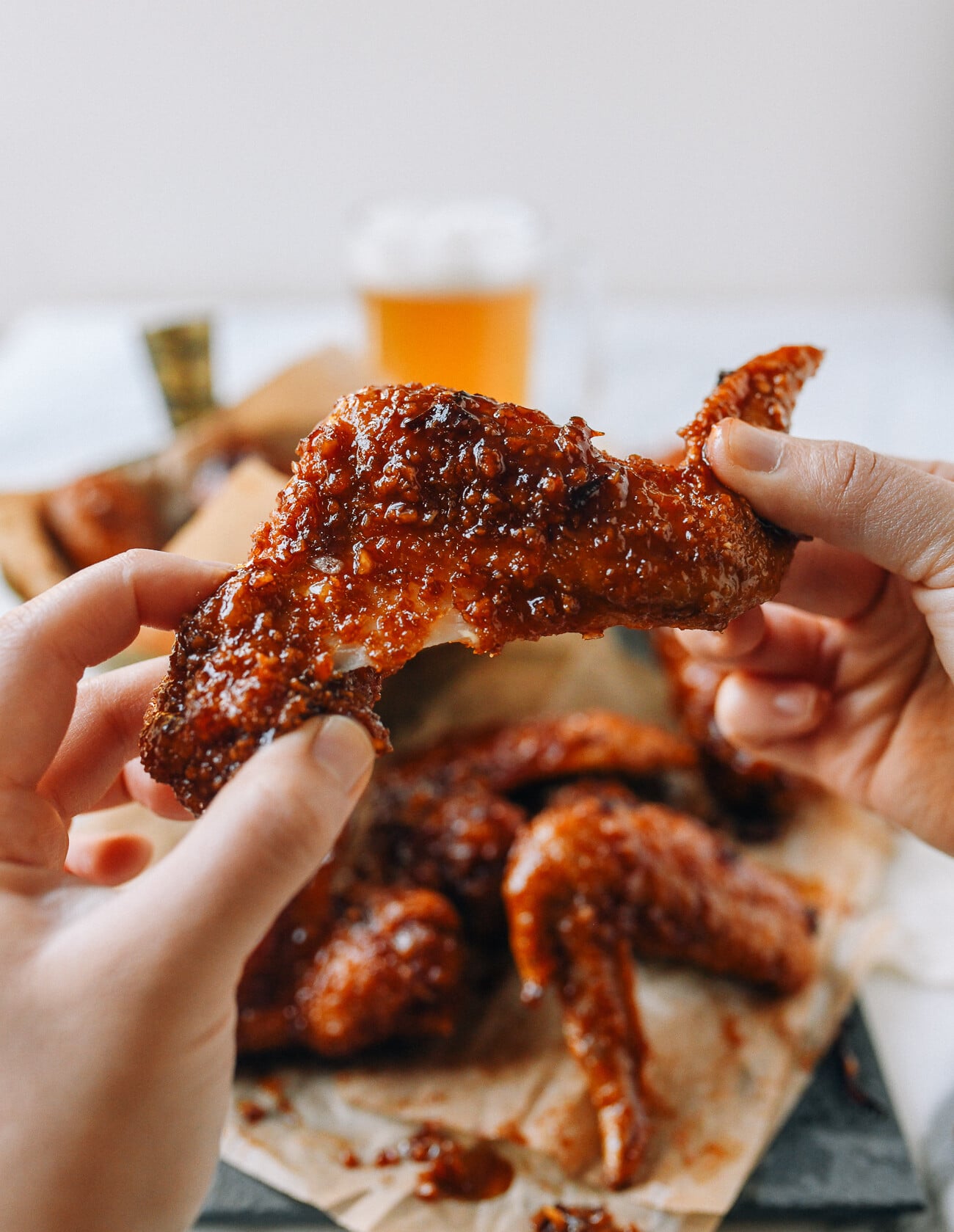 Pulling apart a Korean Soy Garlic Chicken Wing