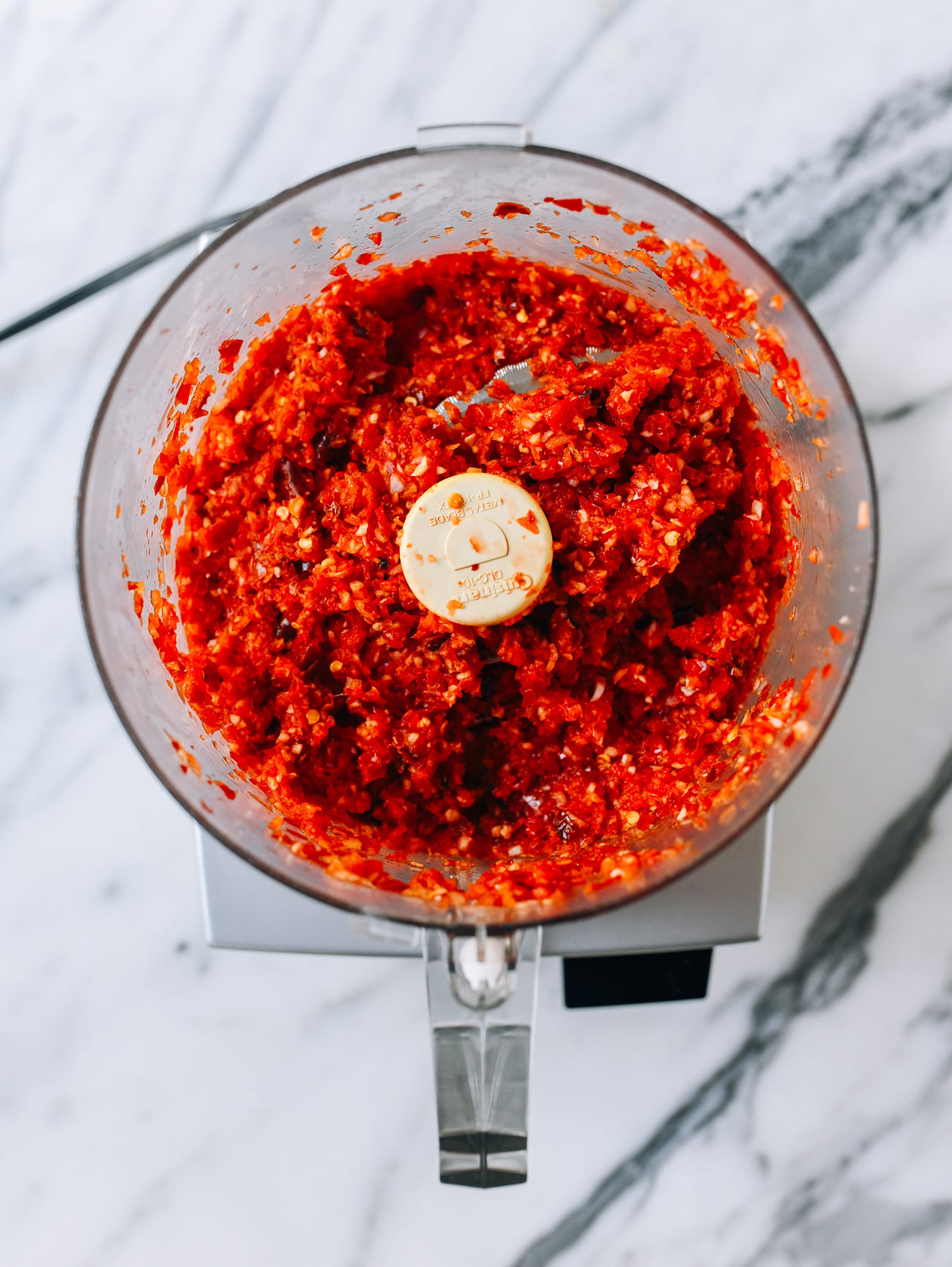 Paste of chili, shallots, and garlic in food processor