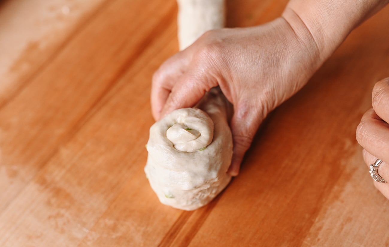 Rolling dough rope into a spiral
