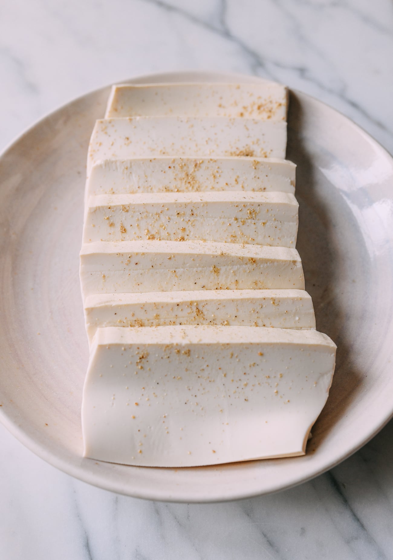 Tofu sprinkled with white pepper