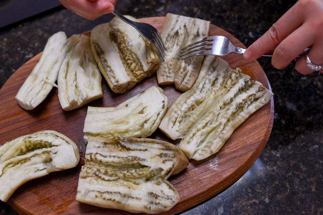 Opening up steamed eggplants