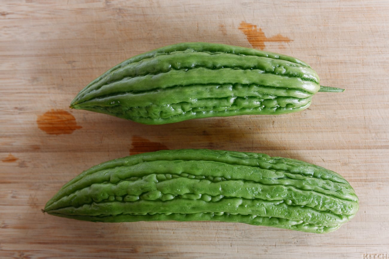 Bitter melons on cutting board