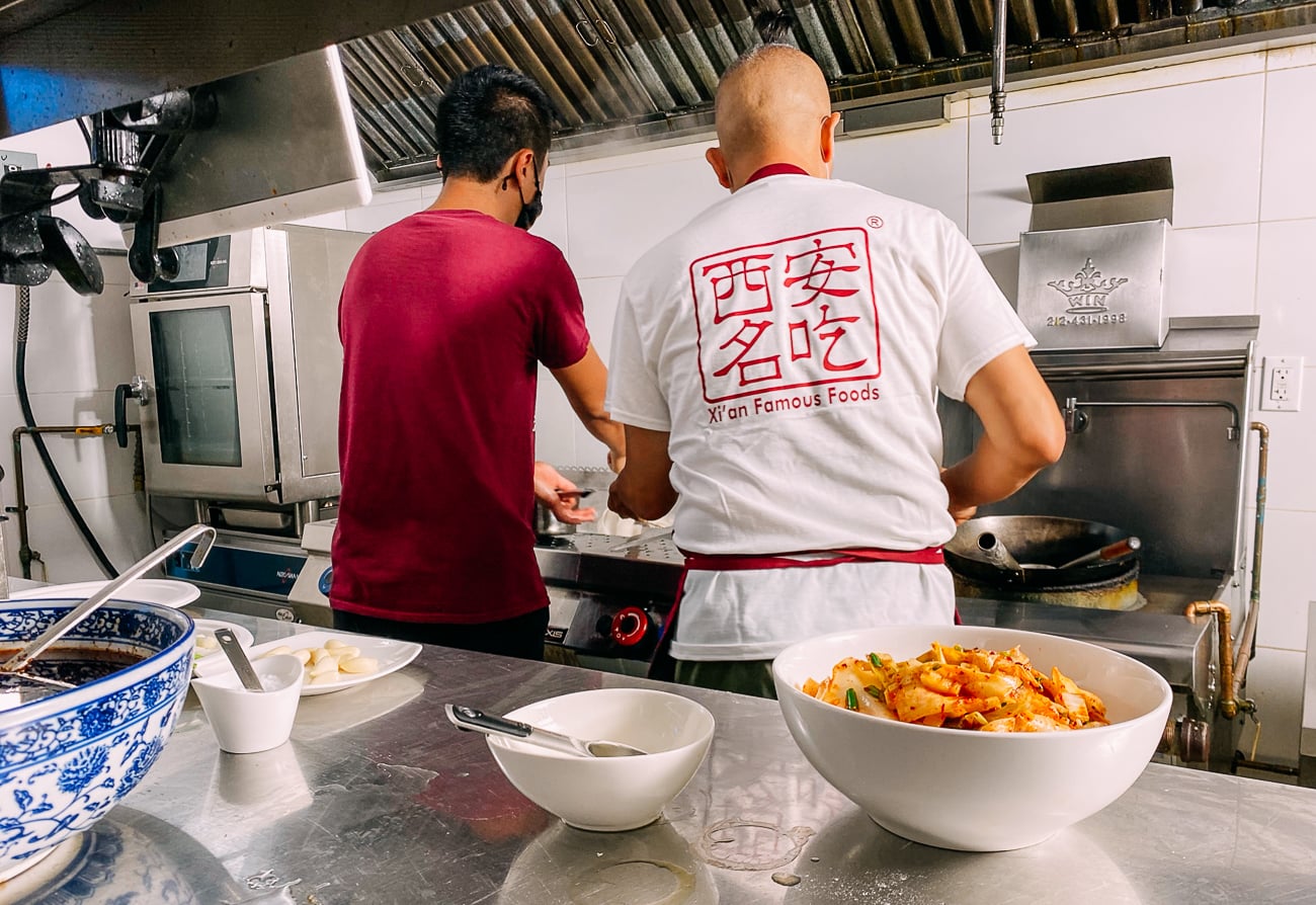 Jason Wang and David Shi preparing noodles