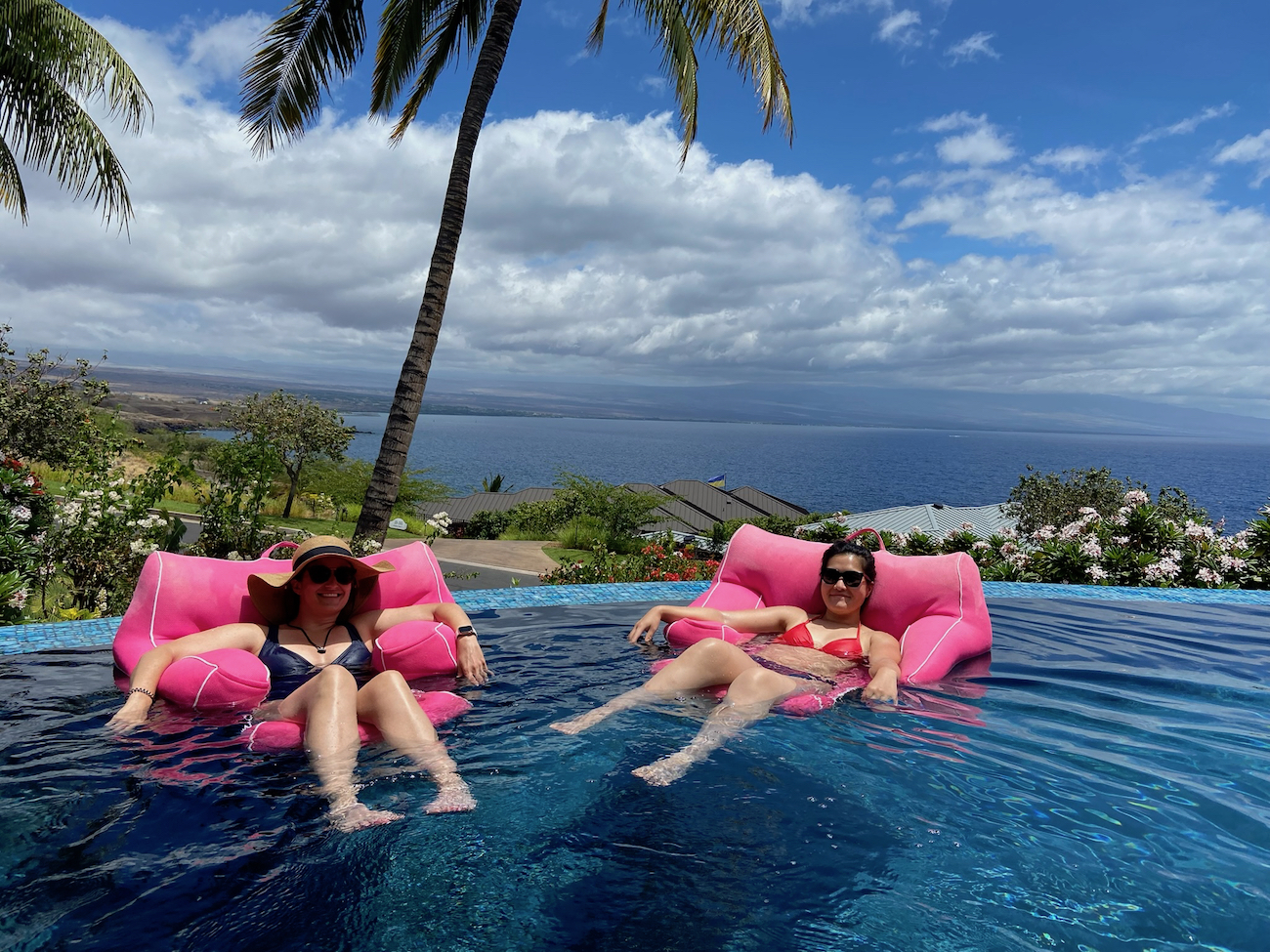 staci and sarah relaxing in a pool