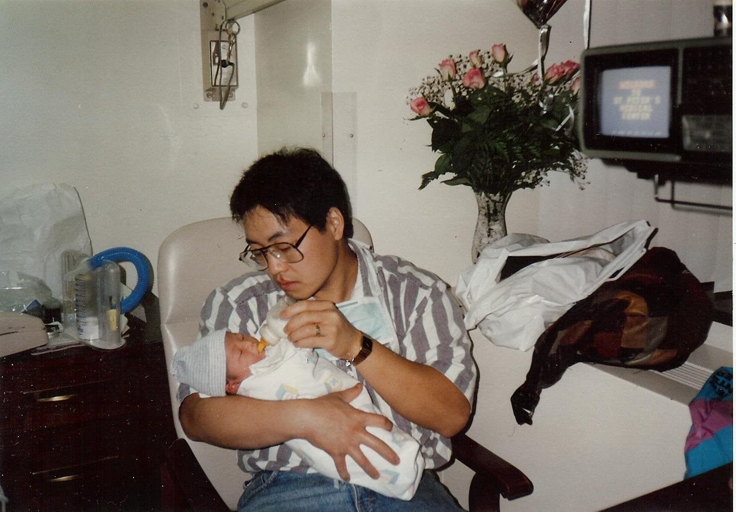 The Woks of Life Old Family Photo - Bill feeding baby Sarah