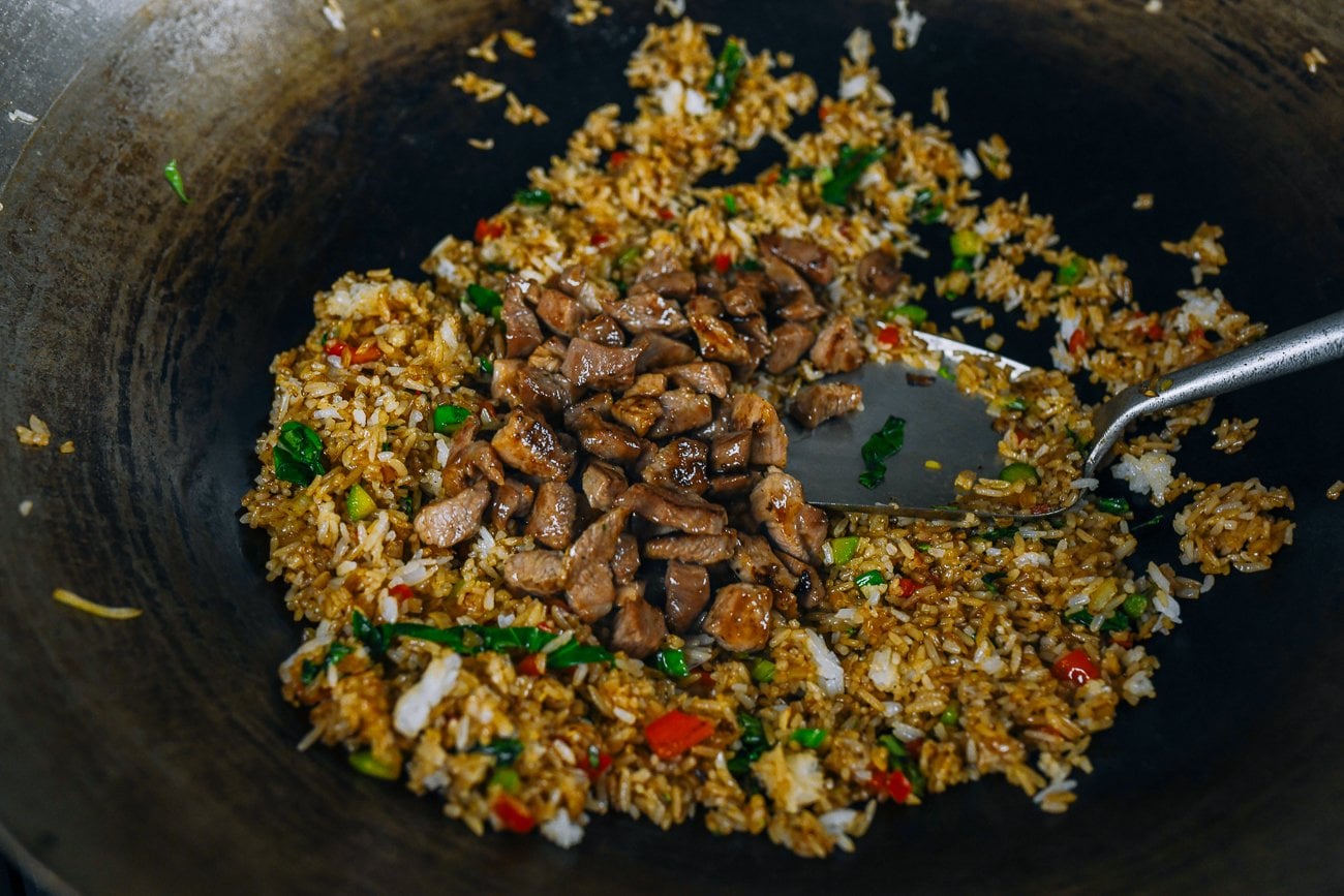 adding pork back to fried rice