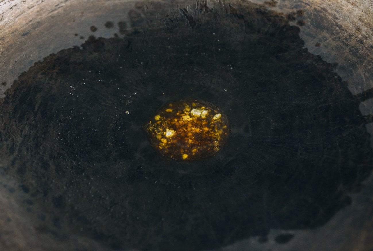 melting rock sugar in wok