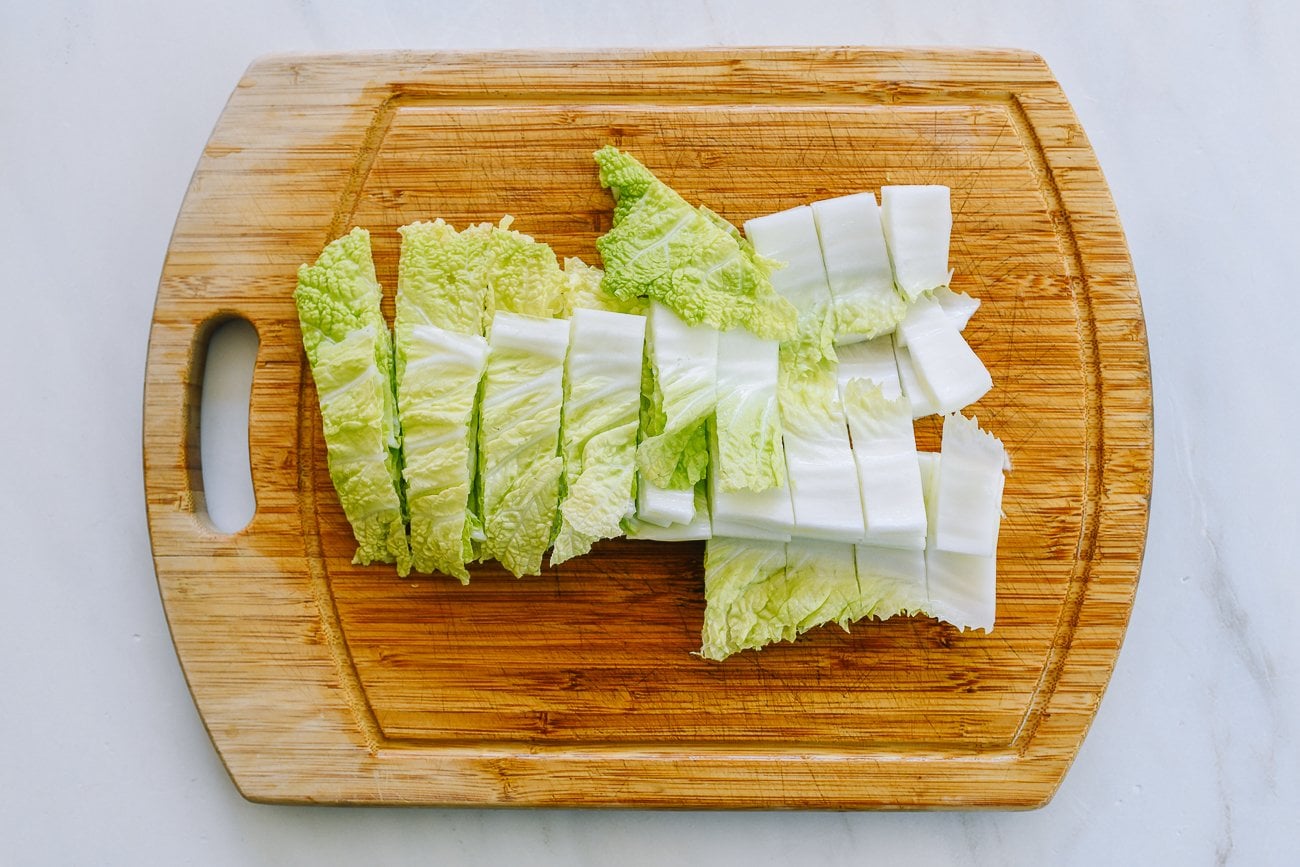 sliced napa cabbage on cutting board