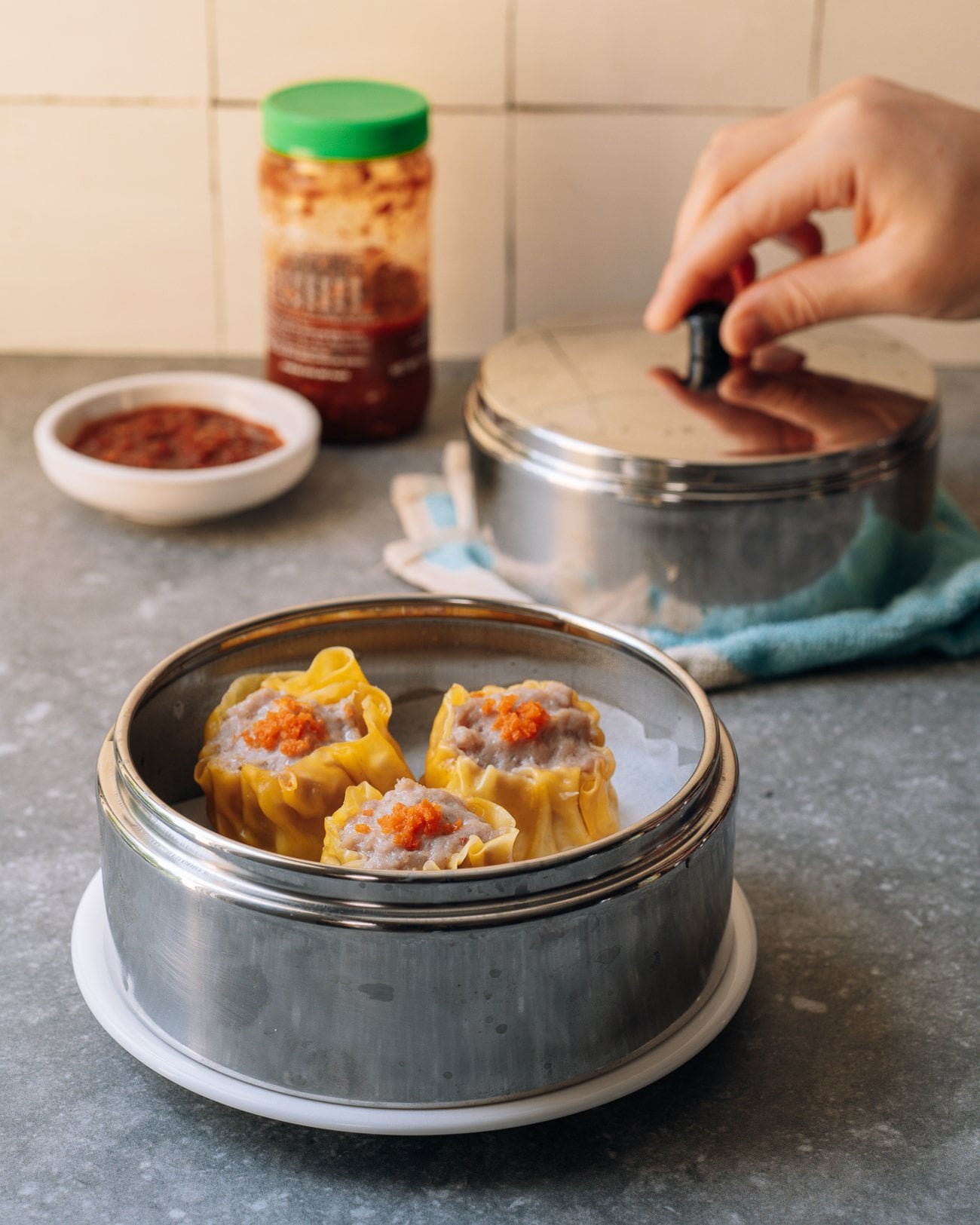 siu mai in metal dim sum steamer basket