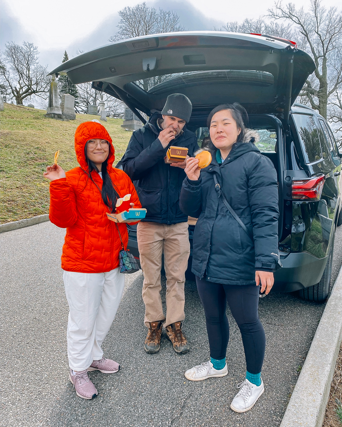 Kaitlin, Justin and Sarah with cold McDonalds outside car
