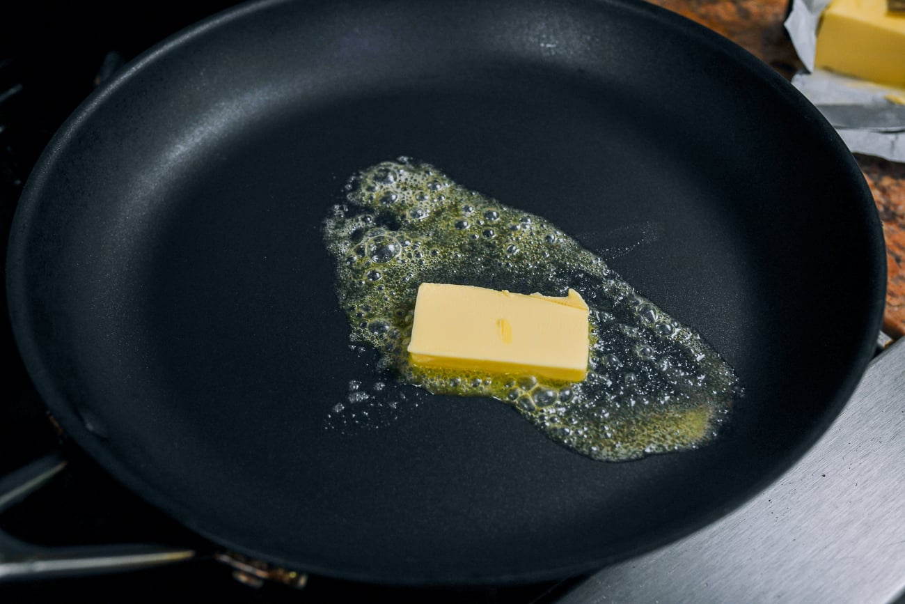 butter melting in skillet