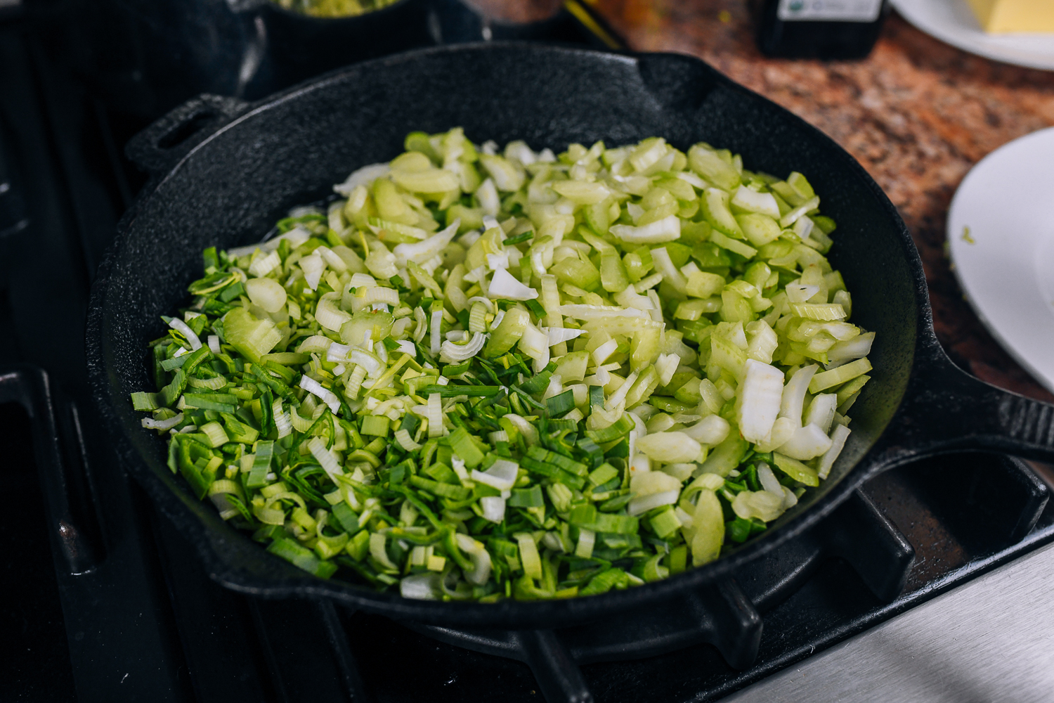 cooking celery and leeks in pan
