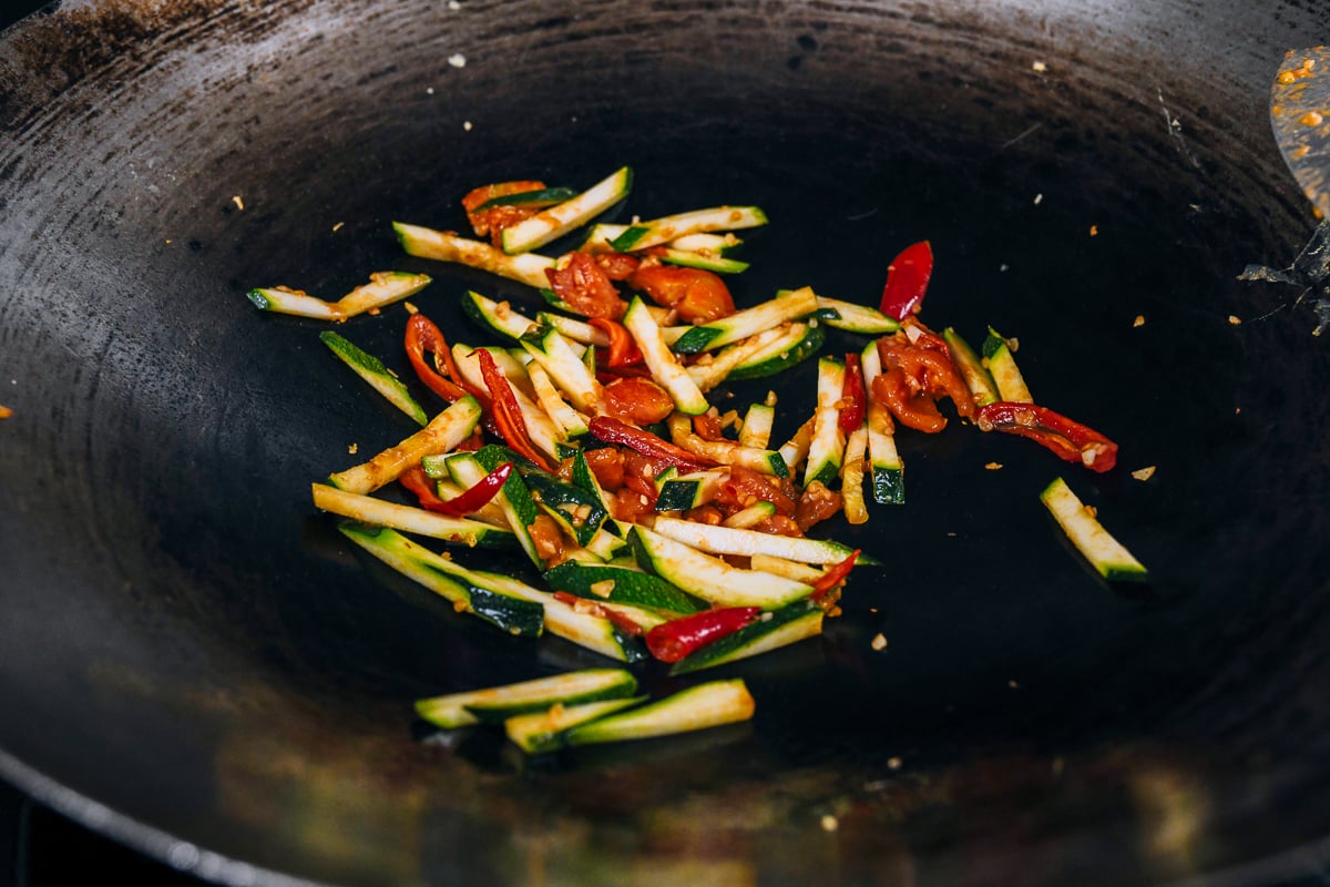 stir-fried zucchini, tomato, garlic and chili