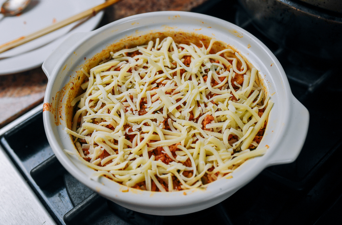 shredded cheese on top of rice