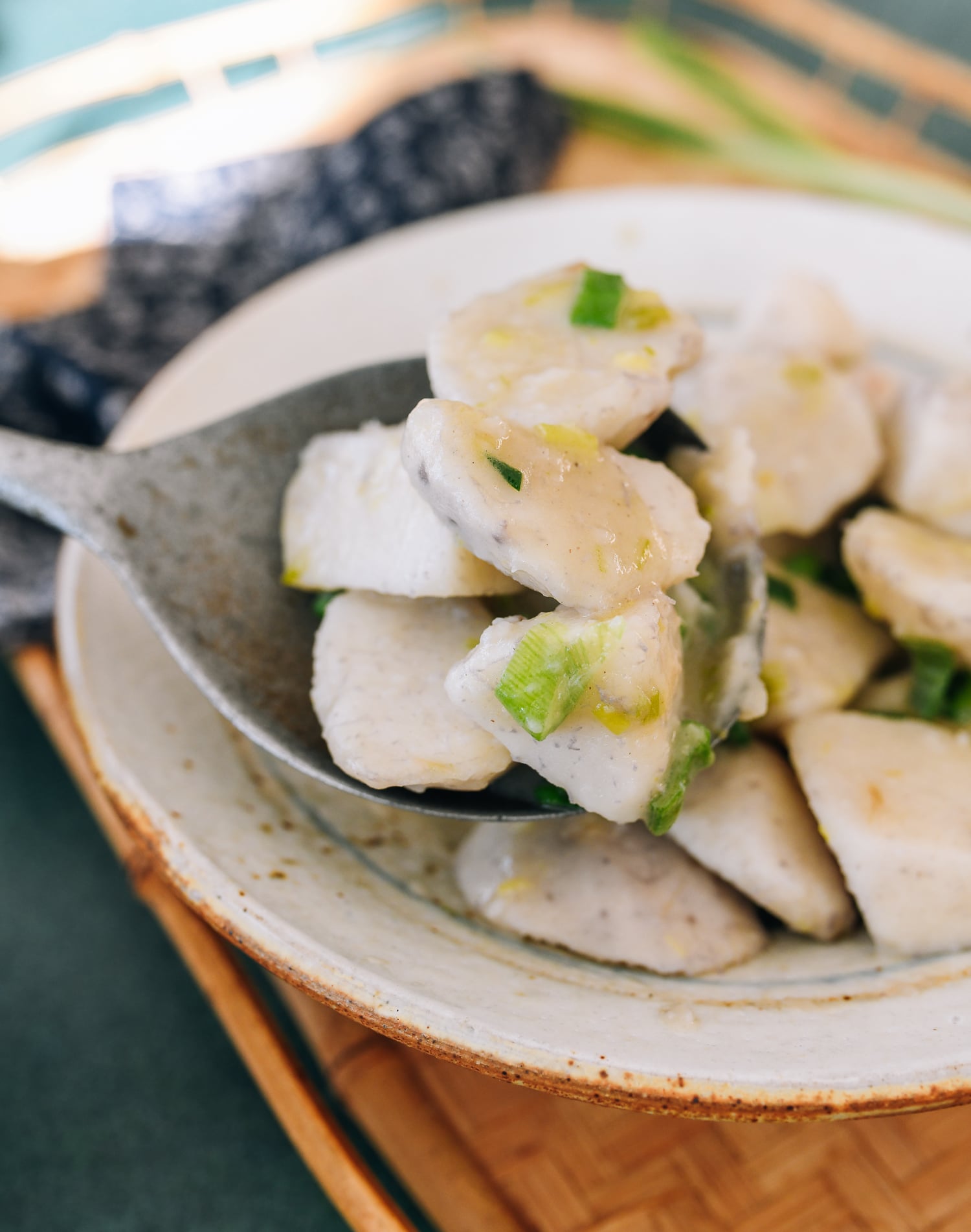 scoop of taro stir-fried with scallion