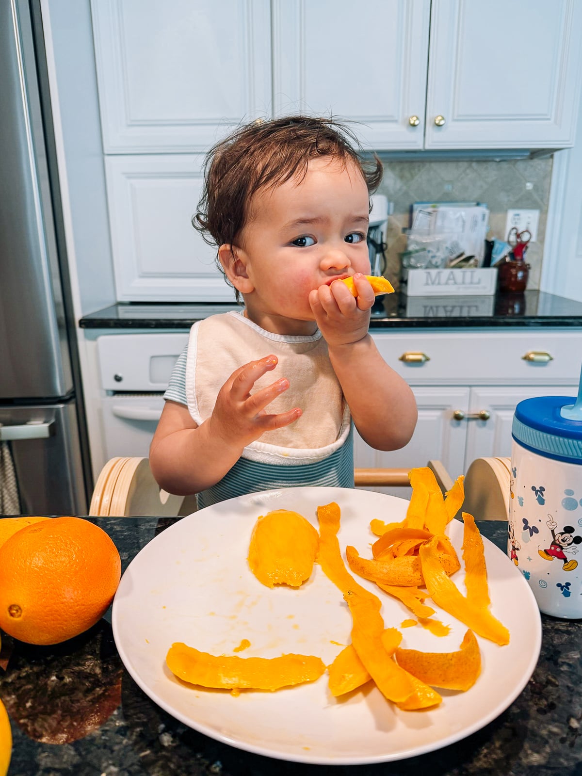 Ethan eating mango