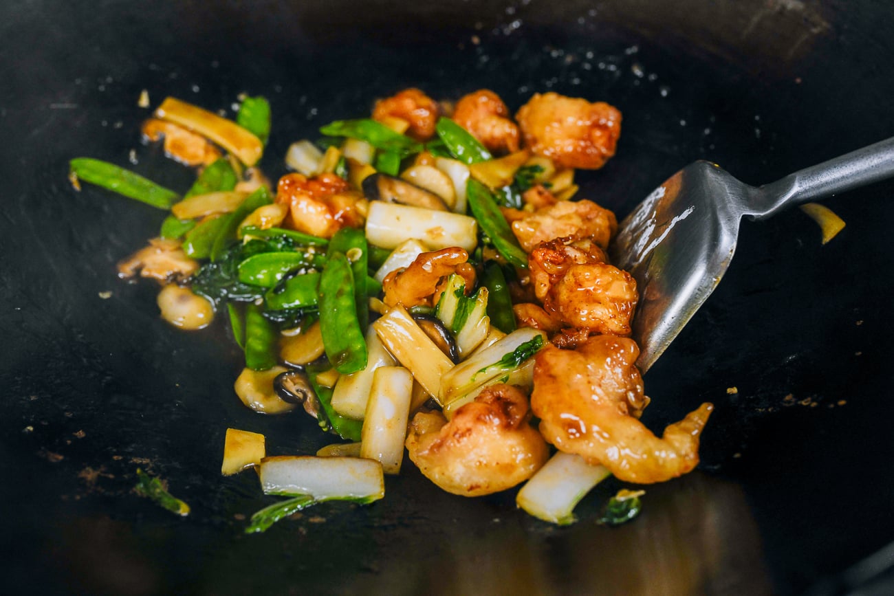 stir-frying chow har kew in wok